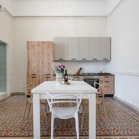 Апартаменты Lexa Experience - Roomy & Таранто